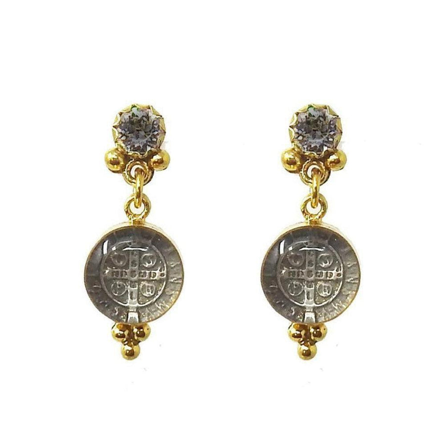 Gold drop earrings featuring clear glass medallions with silver-toned religious charms and clear cubic zirconia accents.
