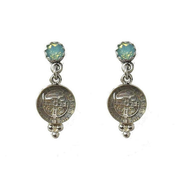 Silver earrings featuring pale green opal accents and antique coin-inspired detailing.
