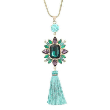 Amethyst & Turquoise Tassel Necklace:  Gold chain, large emerald green gemstone, purple & green accents, turquoise tassel.
