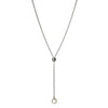 Anthology Chain: Elegant silver chain necklace with a dark bead and gold ring detail.
