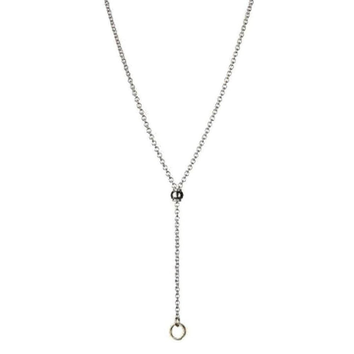 Anthology Chain: Elegant silver chain necklace with a dark bead and gold ring detail.
