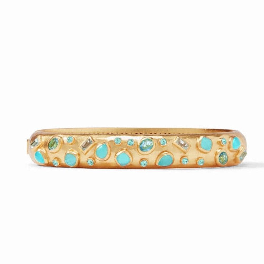 Antonia Demi Hinge Bangle: Gold hinged bangle adorned with turquoise and blue gemstones.
