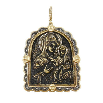 Arched Madonna Medal with Diamond Halo:  Gold & bronze pendant featuring Madonna and Child, adorned with shimmering diamonds.
