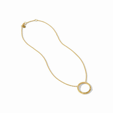 Gold necklace with textured circular pendant and small diamonds.
