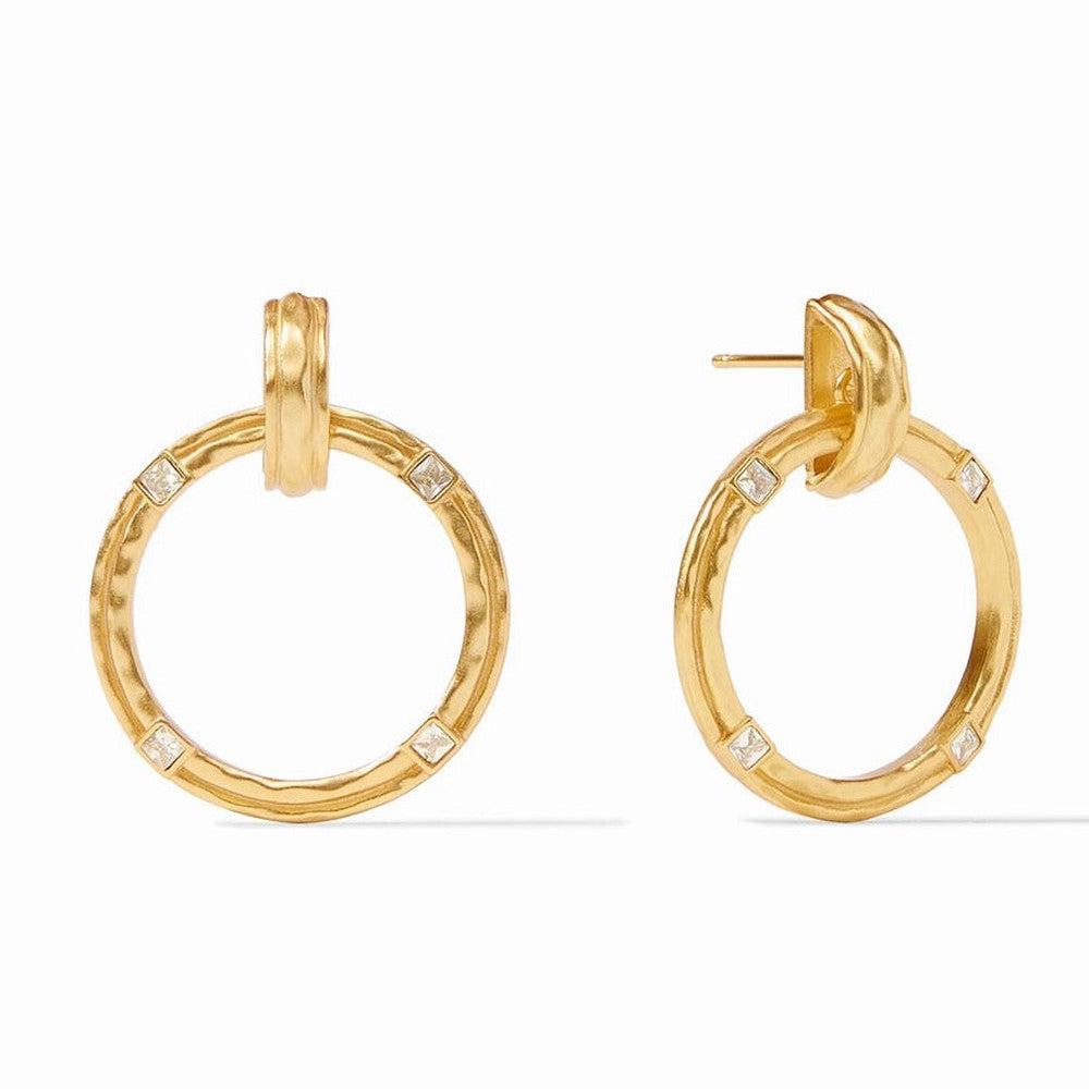 Astor Doorknocker Earrings: Gold-tone hammered metal hoop earrings with clear cubic zirconia accents.
