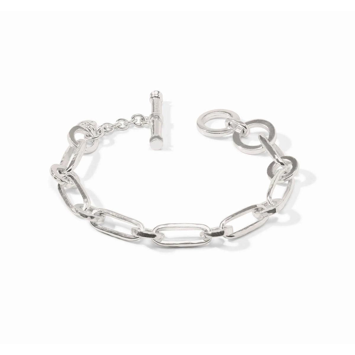 Silver-tone textured link bracelet with a toggle closure, 7-7.5 inches long.