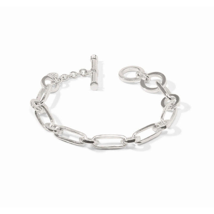 Silver-tone textured link bracelet with a toggle closure, 7-7.5 inches long.