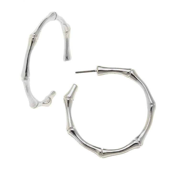 Silver bamboo-style hoop earrings; post backing.
