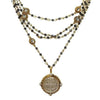 Bicone Magdalena Gold Hematite necklace: layered black hematite beads, gold accents & St. Jude medal.
