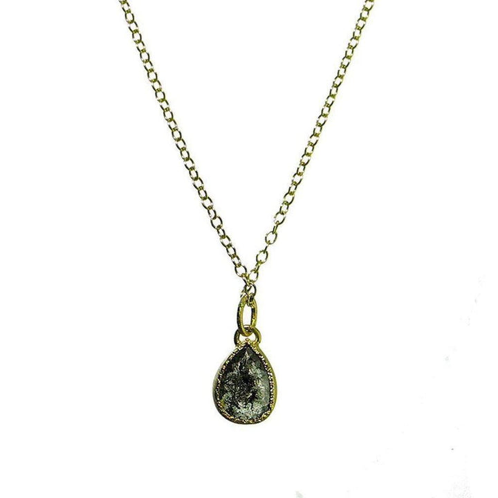 18k gold necklace featuring a pear-shaped black diamond pendant.
