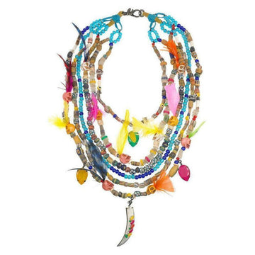 Multi-strand Black Magic necklace with colorful beads, feathers, and skull accents, featuring a unique tusk pendant.
