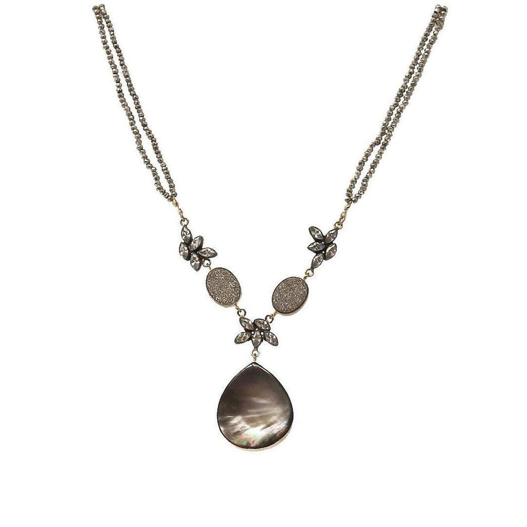 Black Mother of Pearl teardrop necklace with gray diamond accents.

