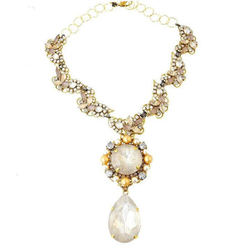 Elegant gold necklace with pearlescent and blush-toned stones, featuring a large teardrop pendant.
