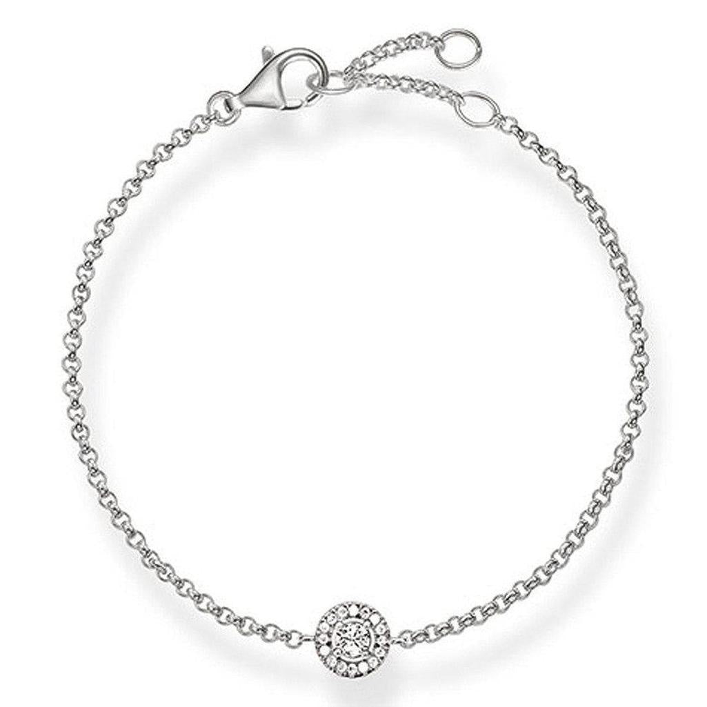 Silver chain bracelet with a central diamond halo pendant.

