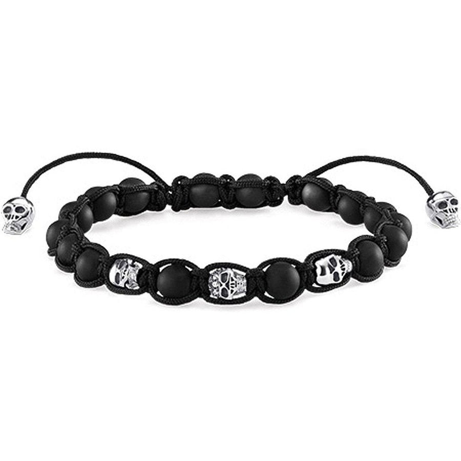 Black obsidian and sterling silver skull bracelet with adjustable cord.
