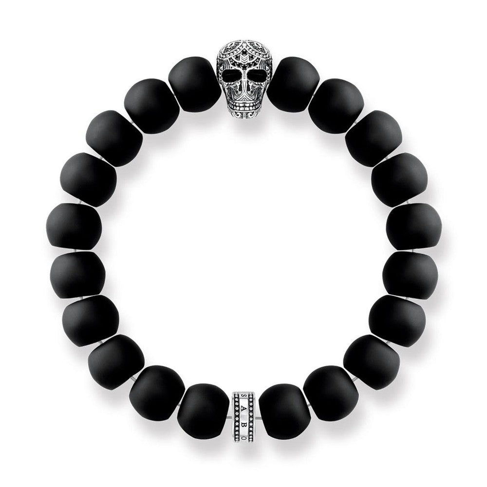Black matte beaded bracelet with silver skull accent bead
