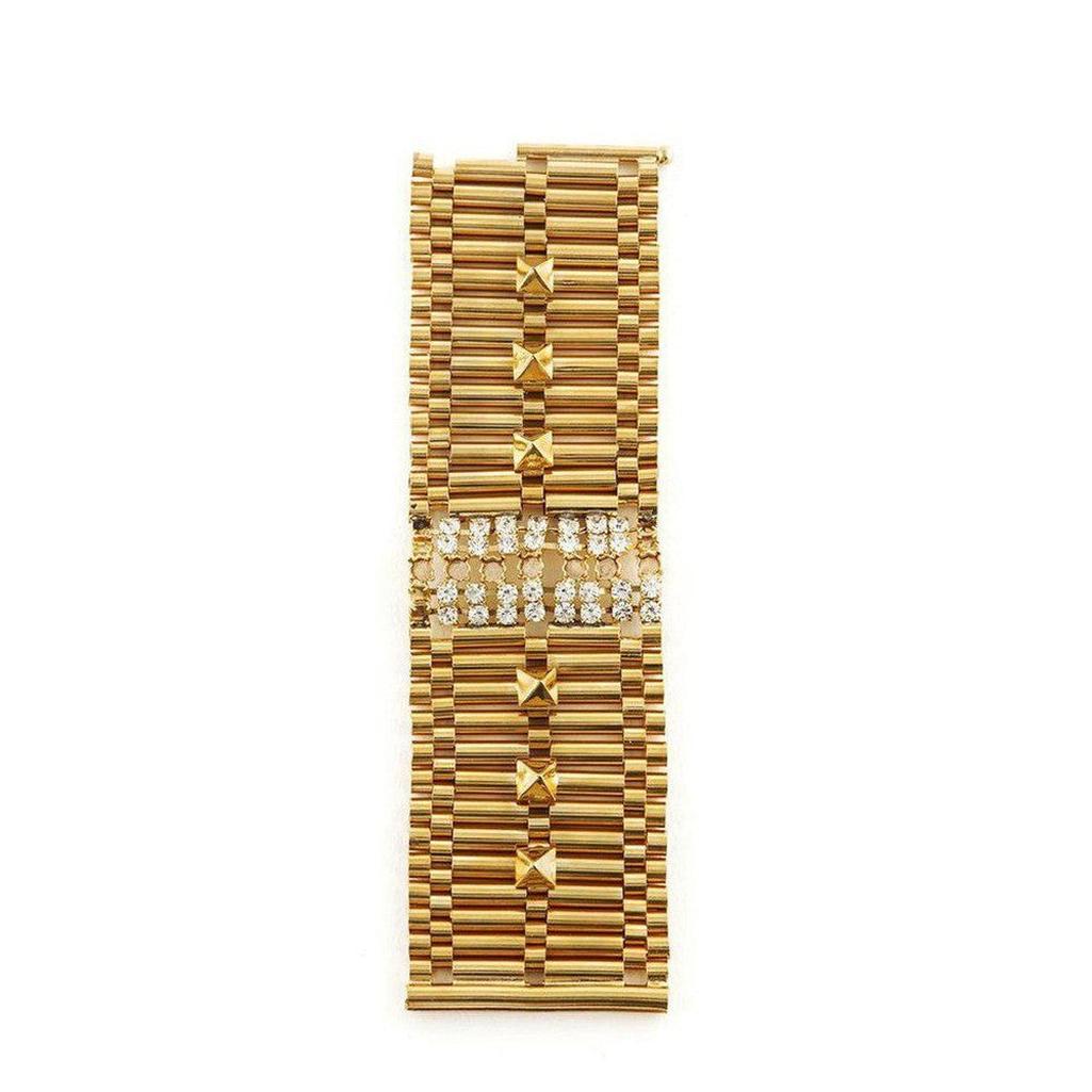 Gold brass chain bracelet with fused stone crystal accents.
