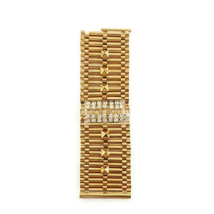 Gold brass chain bracelet with fused stone crystal accents.
