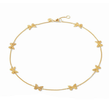 Gold station necklace featuring delicate butterfly charms.
