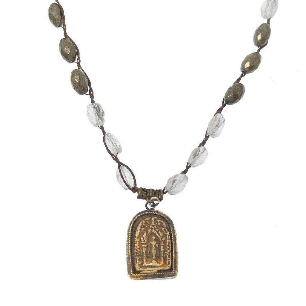 Celestial Shrine Necklace: Bronze pendant with etched detail, clear quartz & pyrite beads on brown cord.
