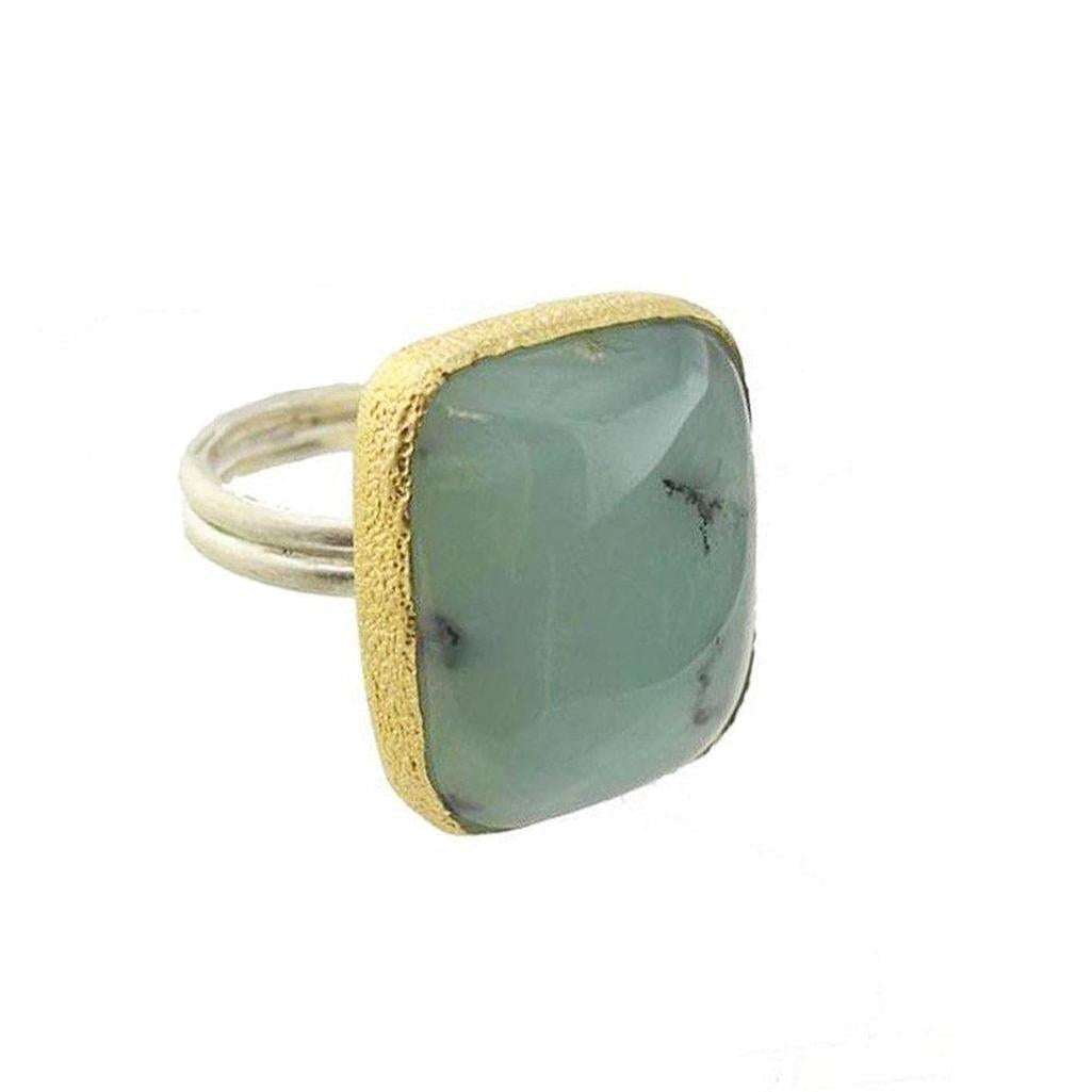 Silver & gold Chalcedony ring with a cushion-cut gemstone.
