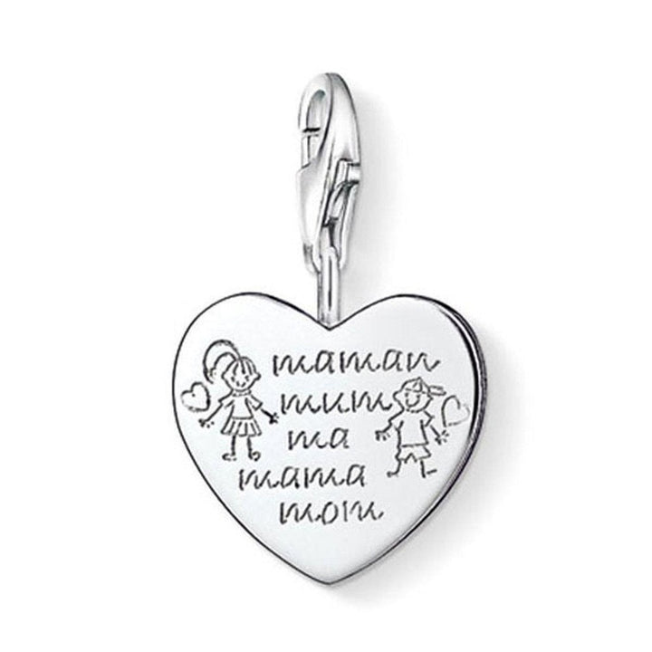 Sterling silver Charm 0784 Mom heart charm with children's drawing and "Mom" in multiple languages.
