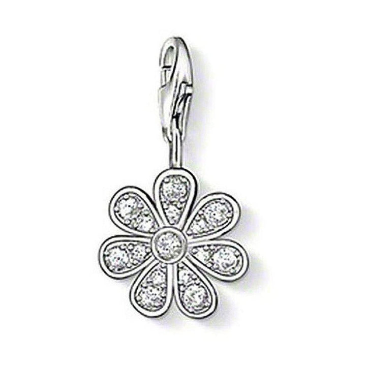 Silver charm featuring a clear zirconia flower design.
