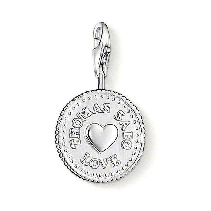 Thomas Sabo Charm 0878 Coin: Sterling silver charm featuring "Love" and a heart, perfect gift.
