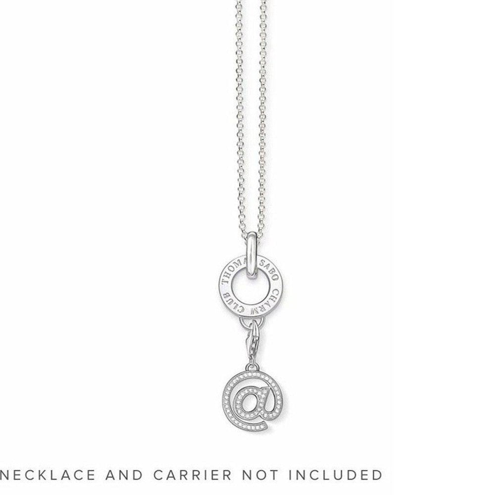 Silver ampersand charm with clear cubic zirconia accents.
