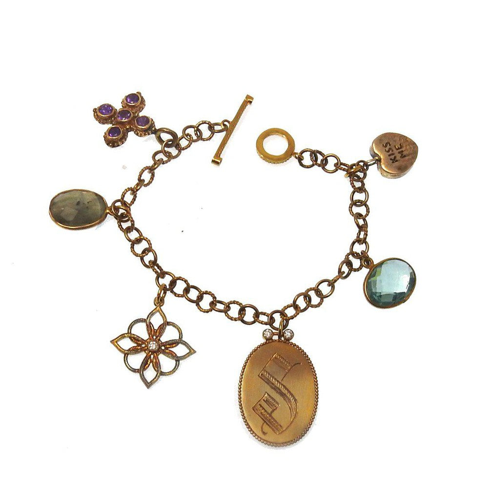 Bronze charm bracelet with amethyst, aquamarine, and other gemstones.
