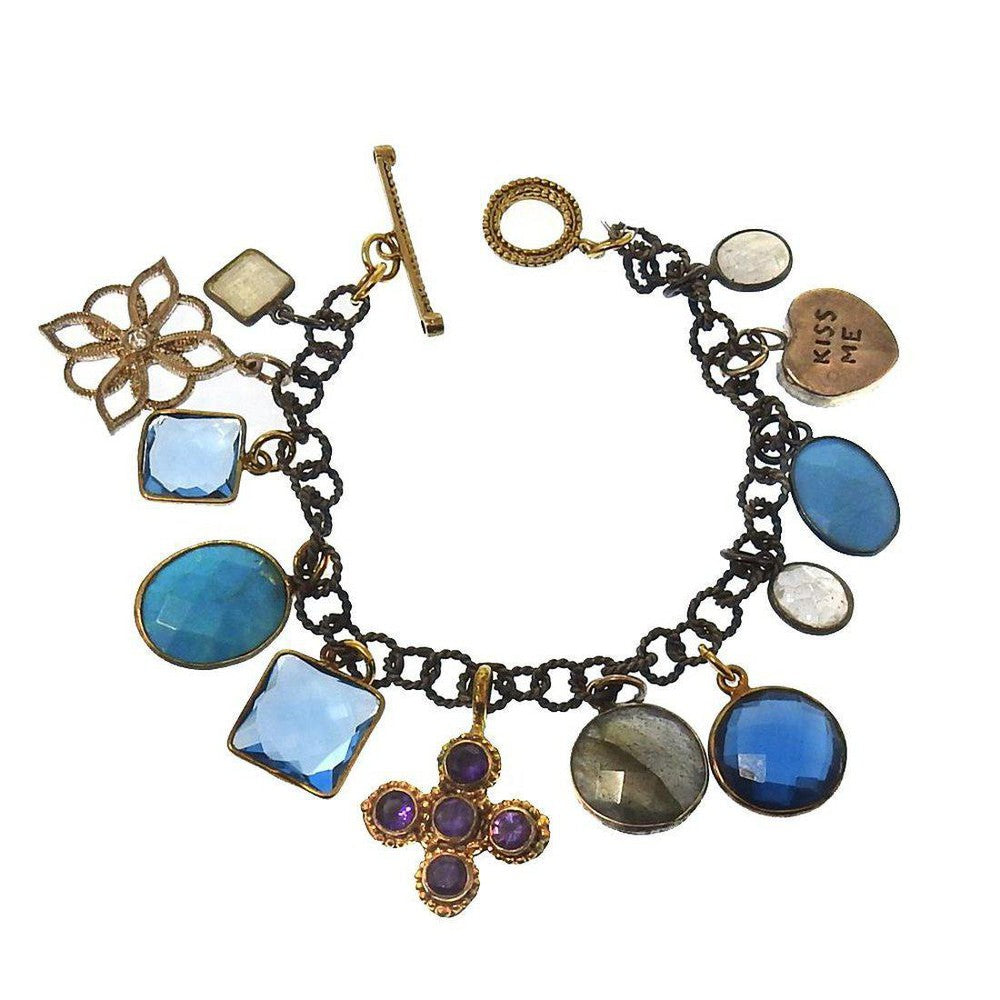 Charm Bracelet Blue Mood: Multi-gemstone charm bracelet with blue, purple & white stones, gold & bronze accents.
