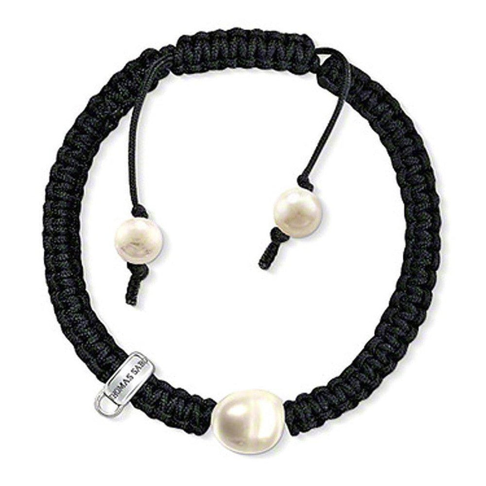Elegant Thomas Sabo black cord charm bracelet with three lustrous pearls.
