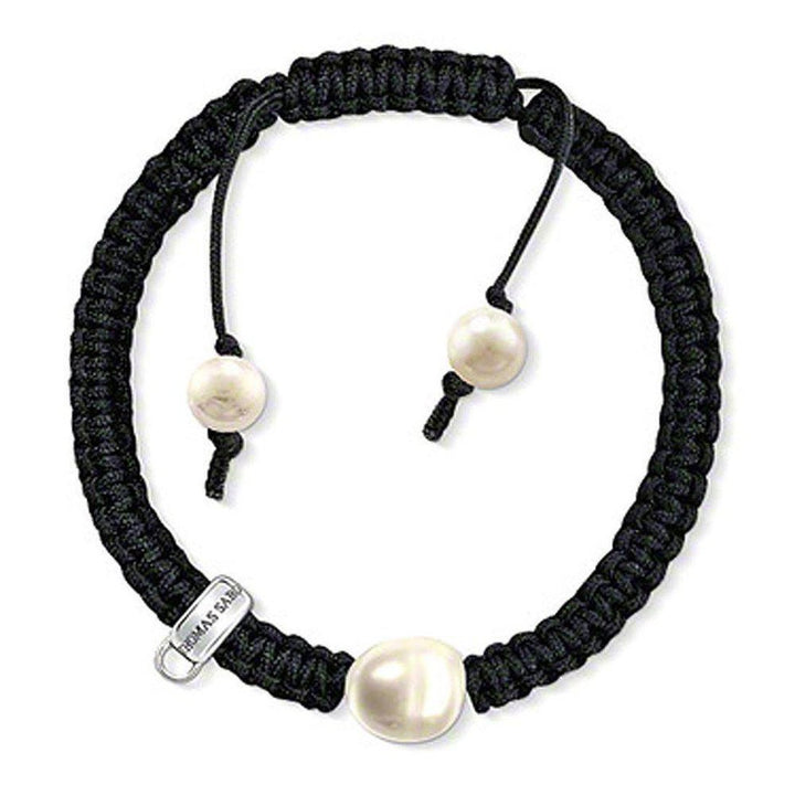 Elegant Thomas Sabo black cord charm bracelet with three lustrous pearls.
