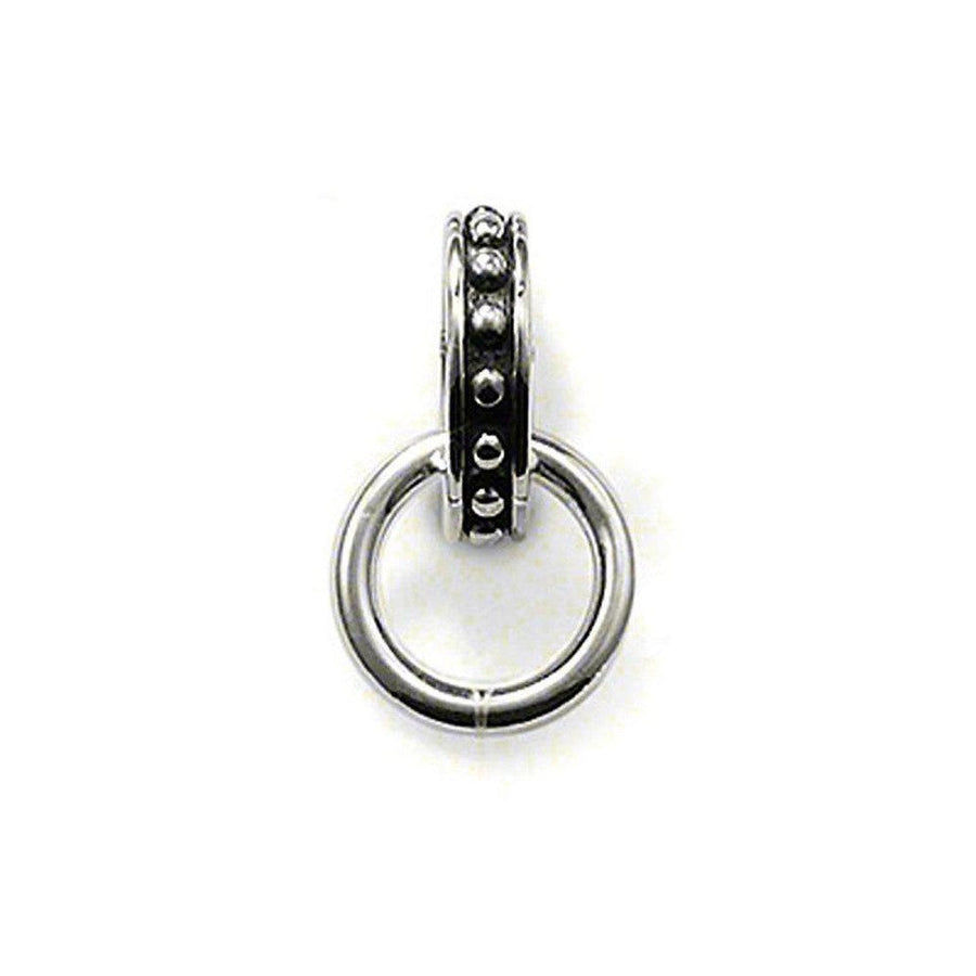 Silver Charm Carrier pendant featuring a textured ring and beaded detail.
