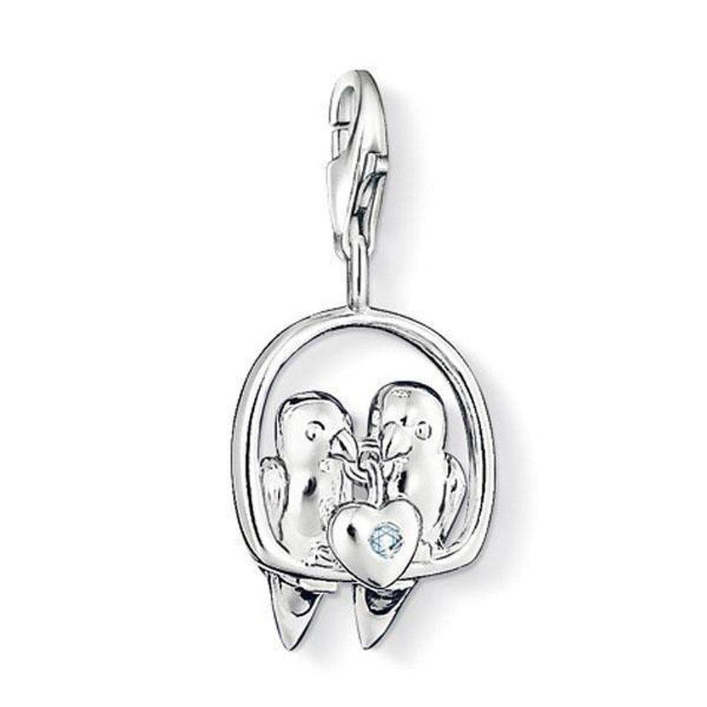 Charm DC0013 Lovebirds diamond charm: Silver-tone lovebirds pendant with a light blue heart-shaped diamond.
