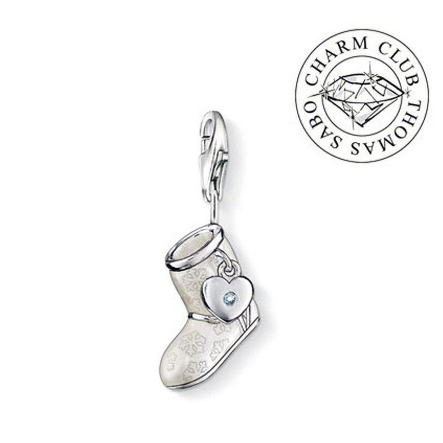 Thomas Sabo Charm Club DC0022 boot charm: white enamel boot with snowflake design, silver heart detail.
