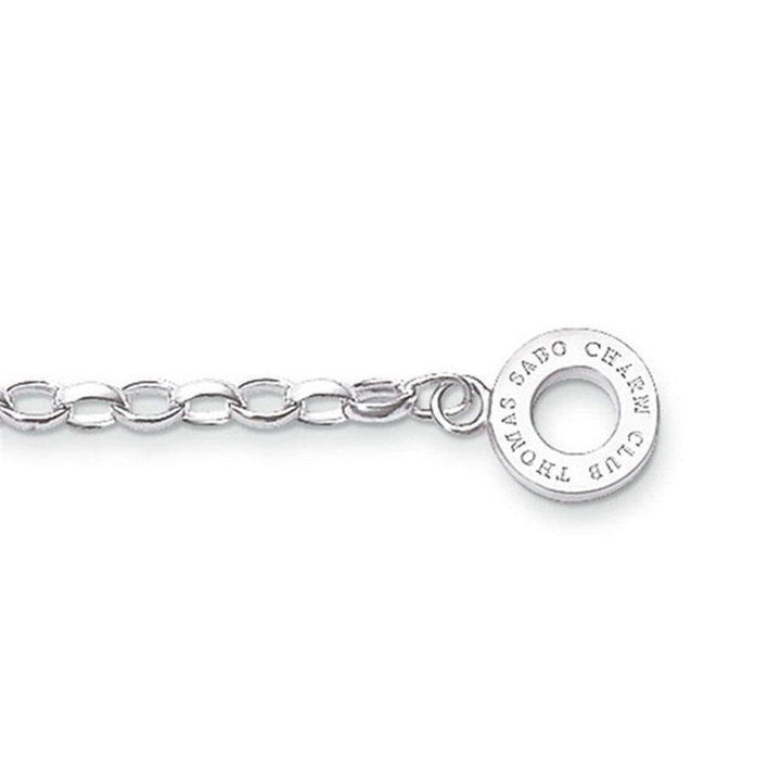 Silver charm bracelet with a chain link design and engraved circular charm.

