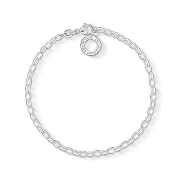 Silver charm bracelet for kids, featuring a Thomas Sabo Charm Club disc.

