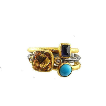 Gold and silver ring set featuring citrine, turquoise, and diamond accents.
