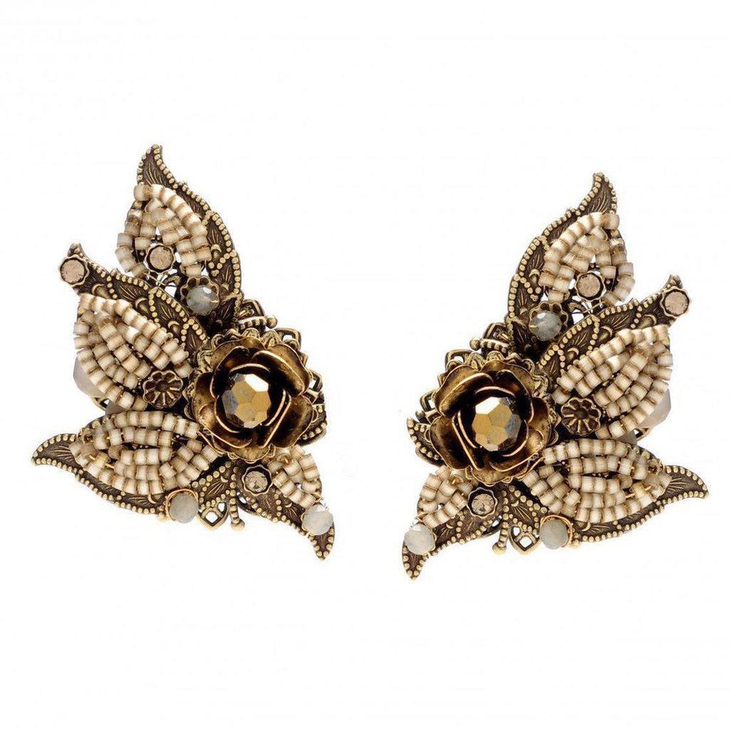 Antique gold beaded floral clip earrings with dark brown crystal accents.
