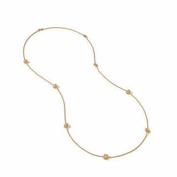 Gold station necklace with delicate floral accents.
