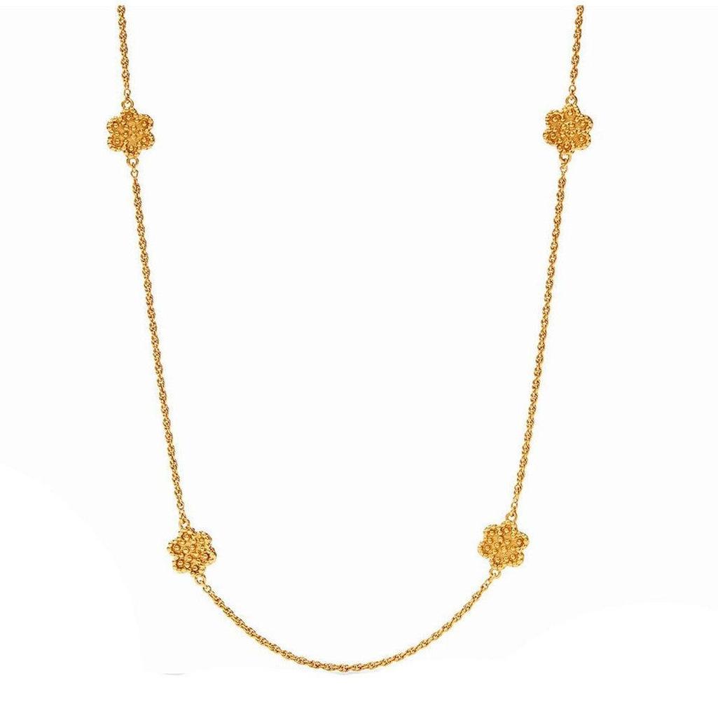 Gold Colette Station necklace with four textured floral accents.
