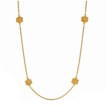Gold Colette Station necklace with four textured floral accents.
