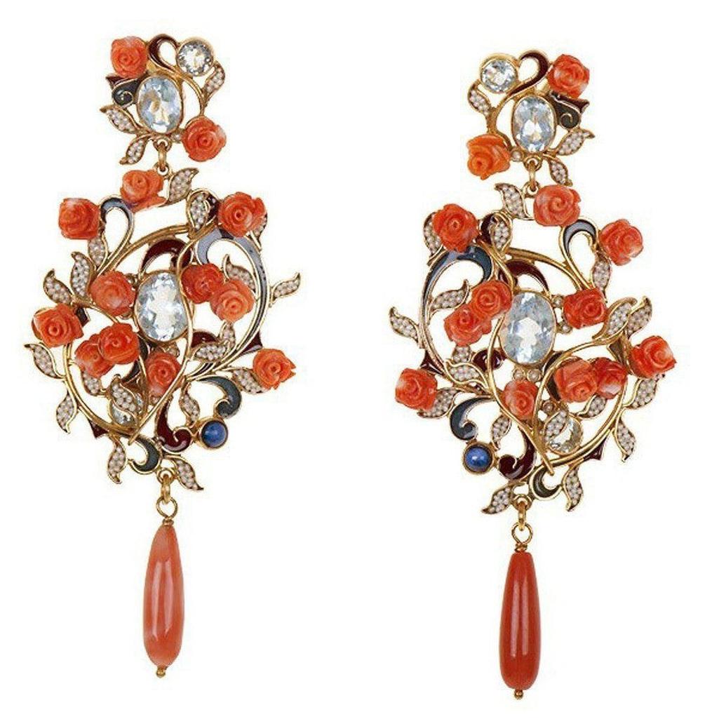 Elegant Coral and Rose gold earrings with aquamarine and pearl accents.

