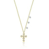 Yellow gold cross necklace with diamond accents and delicate charm drops.
