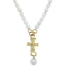Elegant pearl necklace with gold cross pendant
