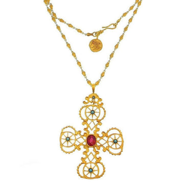 Gold cross necklace with red and blue gemstones, ornate design
