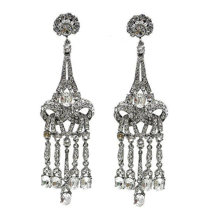 Crystal Chandelier Clip Earrings:  Silver-tone, crystal-encrusted chandelier design; elegant, statement earrings.
