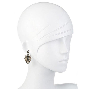 Dark gray crystal drop earrings on a mannequin, showcasing intricate detail.
