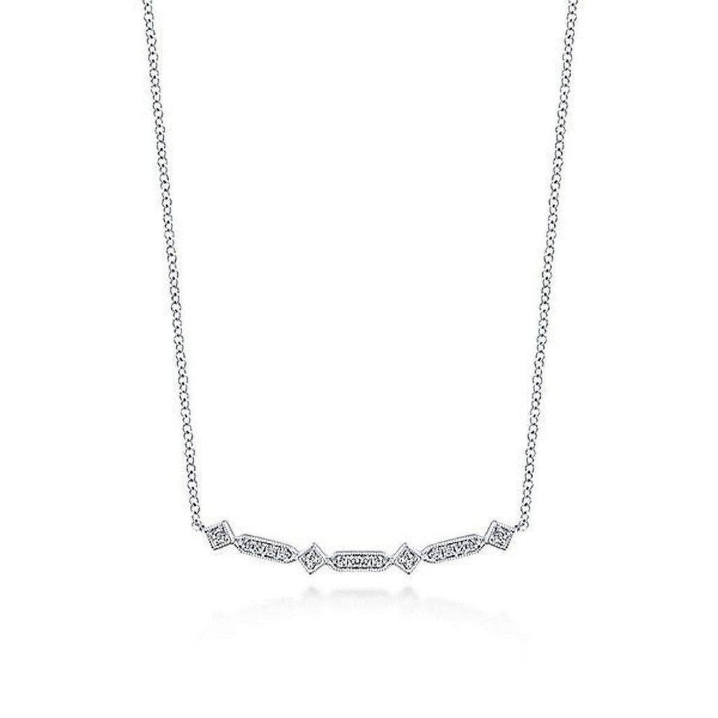 Deco Diamond Bar Necklace: Elegant diamond accents on a delicate chain.
